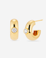 MÉGA Large Donut Earrings in gold vermeil—CZ-studded sculptural hoops, 26 × 10 mm, lightweight at 9 g, with stainless-steel posts.