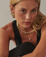 MÉGA Double Round Stud Earrings in gold vermeil—two CZ disc studs 6.46 mm diameter × 2.01 mm, stainless-steel posts, ultra-light 1.09 g.