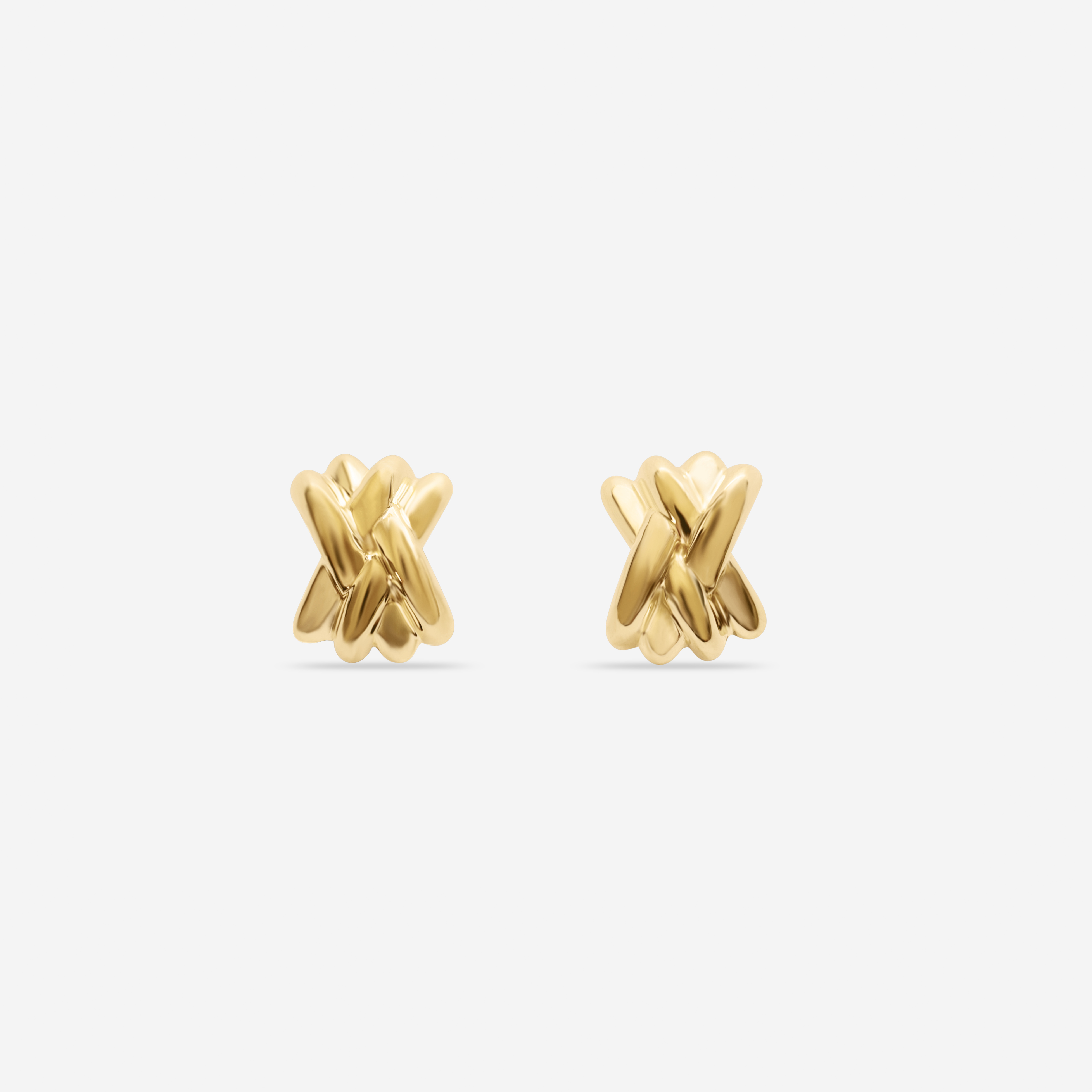 Pair of gold vermeil lattice earrings with interwoven sculptural design, displayed on a white background