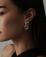 MÉGA Baguetted Earrings in gold vermeil—16 × 7.4 mm mini hoops with channel‑set zircon baguettes, stainless‑steel posts, 8.27 g.