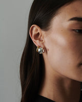 MÉGA Chunky Small Hoop Earrings in gold vermeil—16.5 × 11.5 mm bestselling lightweight hoops, 4 g, with stainless-steel posts.