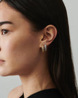 MÉGA Speedy Earrings in gold vermeil—slim fluted hoop earrings, 19 mm wide, 2 mm thick, stainless-steel posts, lightweight 4.76 g.