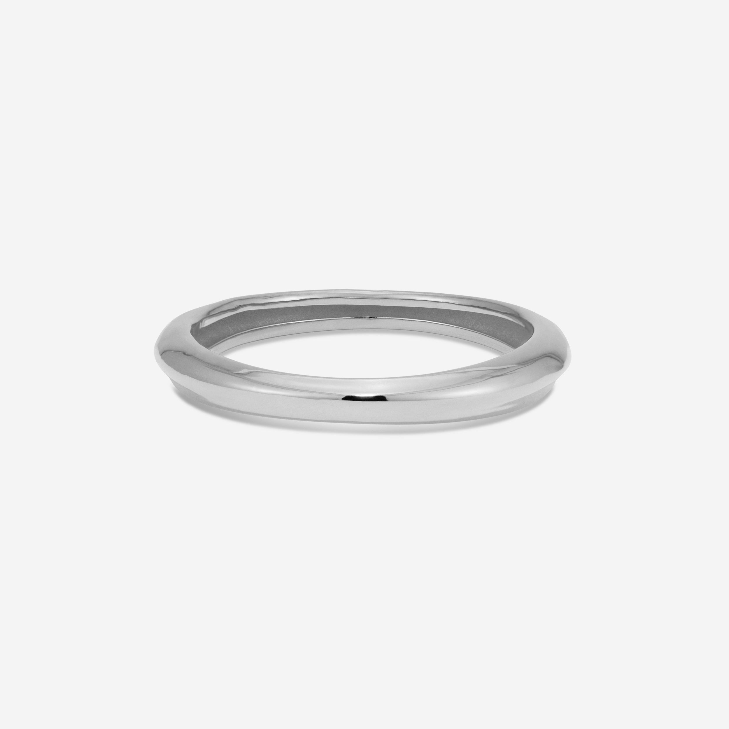 MÉGA Bicep Bangle in gold vermeil—tapered brass upper‑arm cuff, 10.5 mm to 15.6 mm wide, 61.7 g.