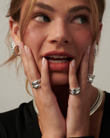 MÉGA Donut Sprinkle Ring Stack—two CZ-dusted hammered donut rings in sterling silver with gold/silver vermeil.