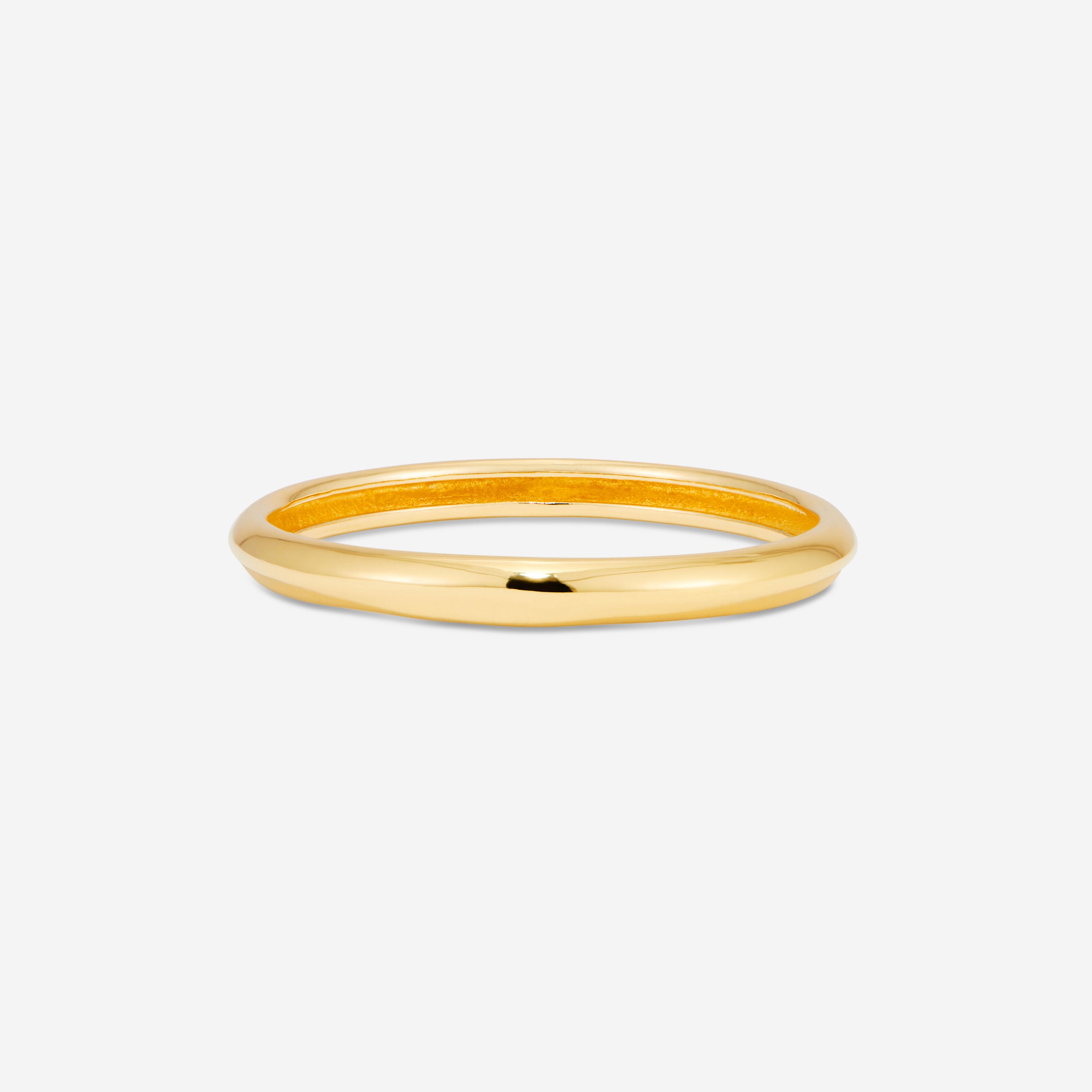 MÉGA Forearm Fun Bangle in gold vermeil—tapered brass bangle 10.5 mm to 15.6 mm wide, weighing 51 g.