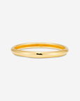 MÉGA Forearm Fun Bangle in gold vermeil—tapered brass bangle 10.5 mm to 15.6 mm wide, weighing 51 g.