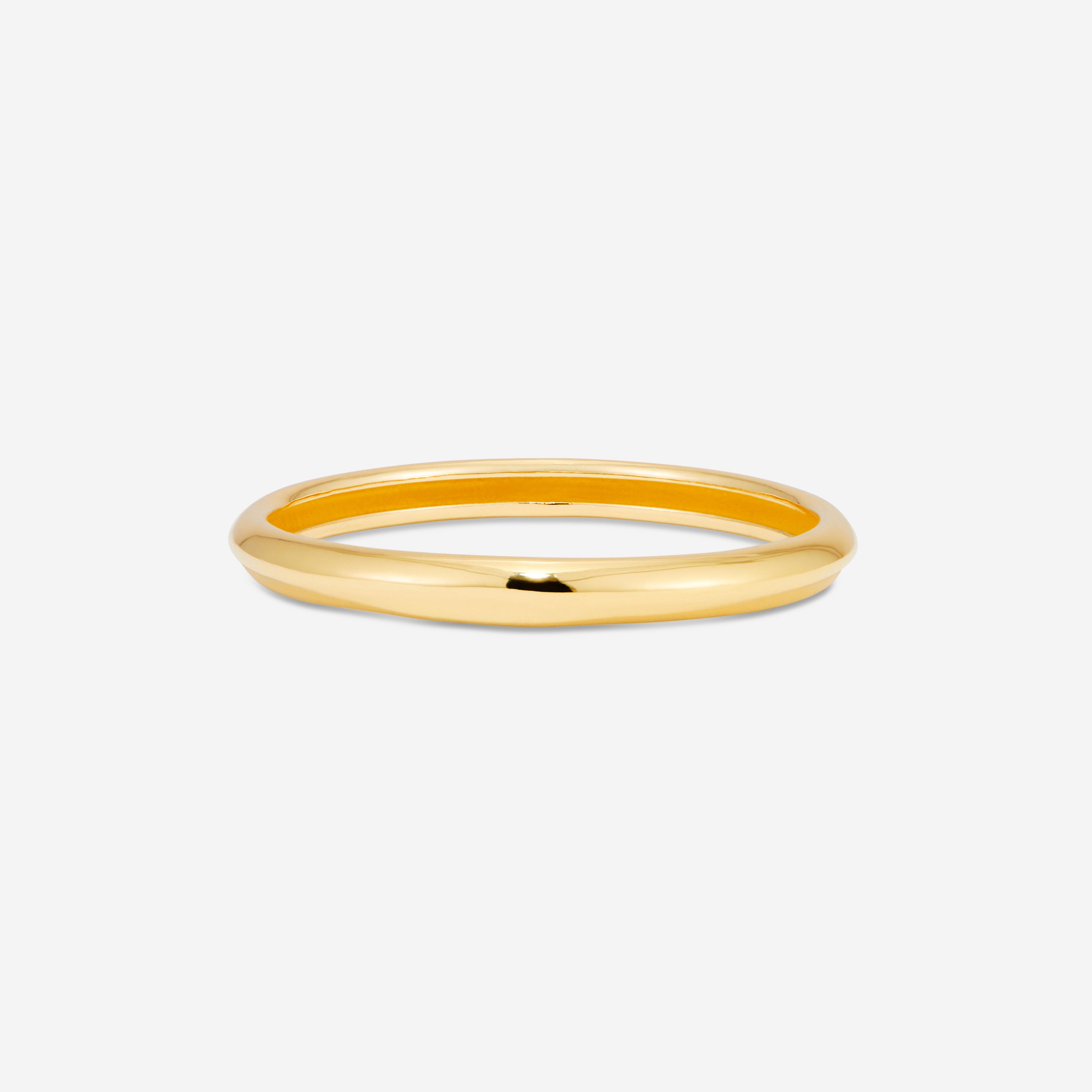 MÉGA Skinny Bangle Bracelet in gold vermeil—a slim 7.7 mm polished cuff for refined everyday wear.