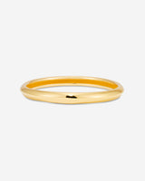 MÉGA Skinny Bangle Bracelet in gold vermeil—a slim 7.7 mm polished cuff for refined everyday wear.