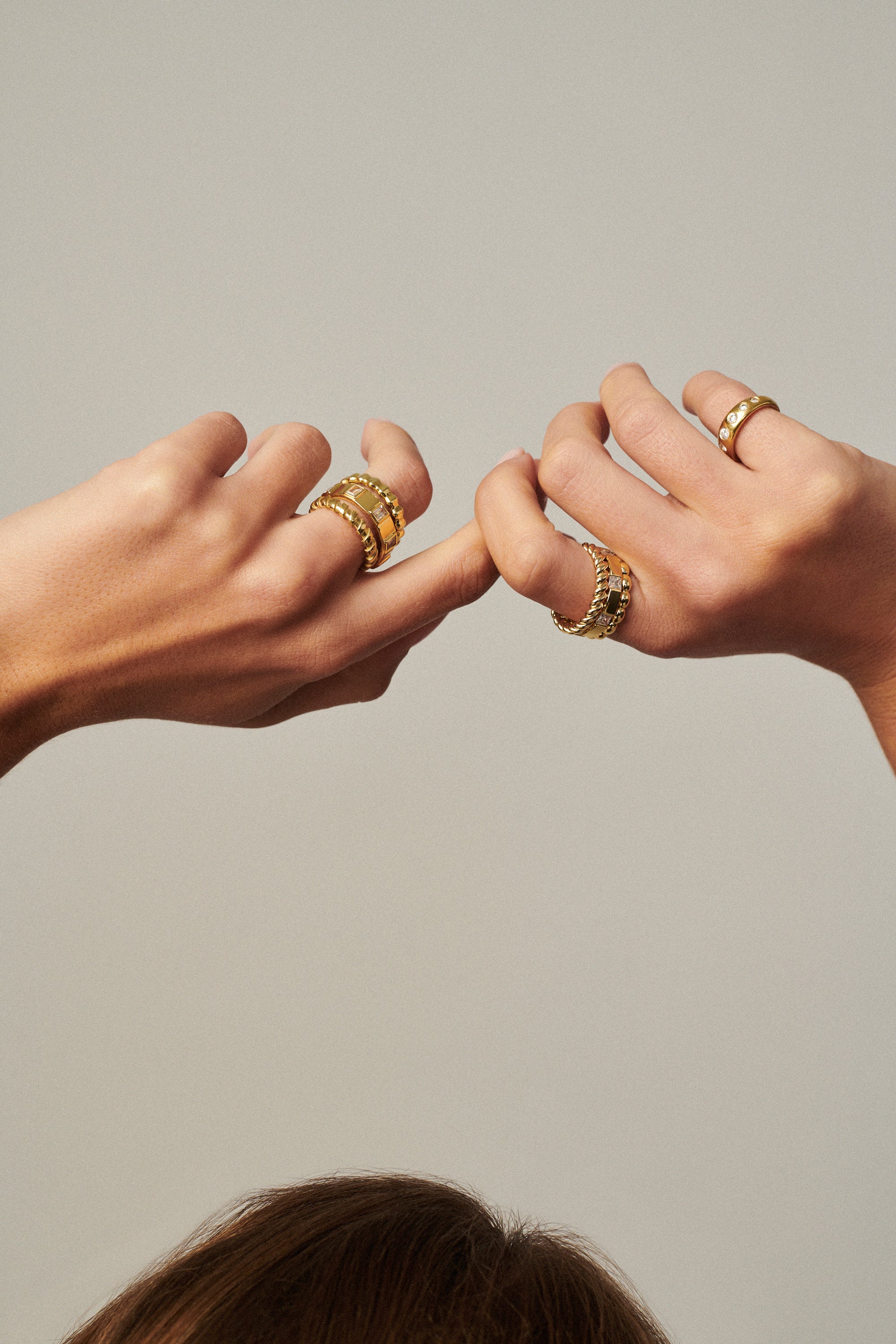 MÉGA High Low Ring in gold vermeil—sterling silver band with elevated and tapered sides, 4 mm wide, 2.5 mm tall.