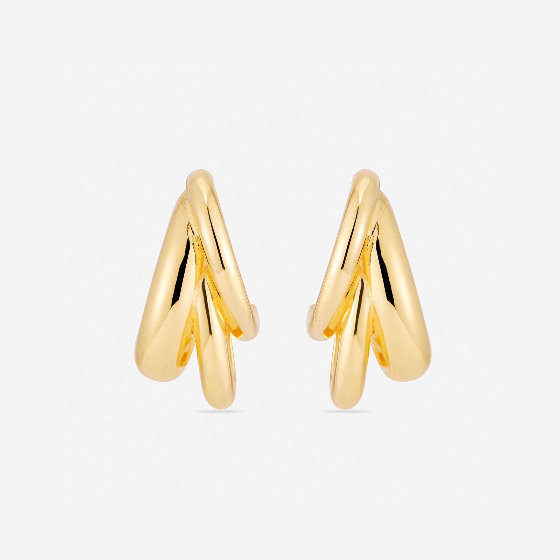 MÉGA Triple Time Earrings in gold vermeil—three graduated hoop earrings measuring 6.9 mm to 16.9 mm wide and 31.2 mm tall.