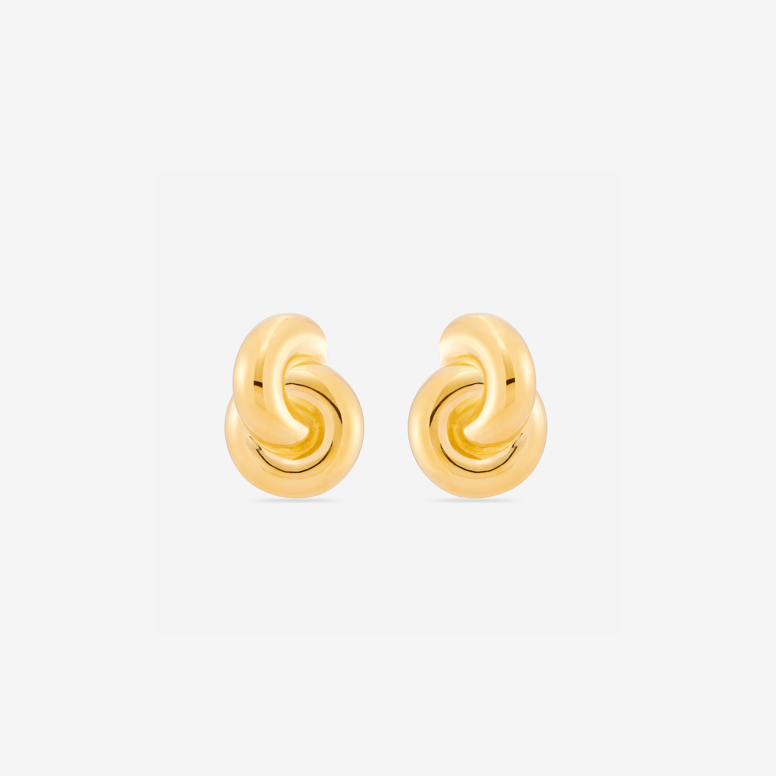 Mini Double Knot Earrings in gold, featuring interlocking loops for a sculptural, polished look.