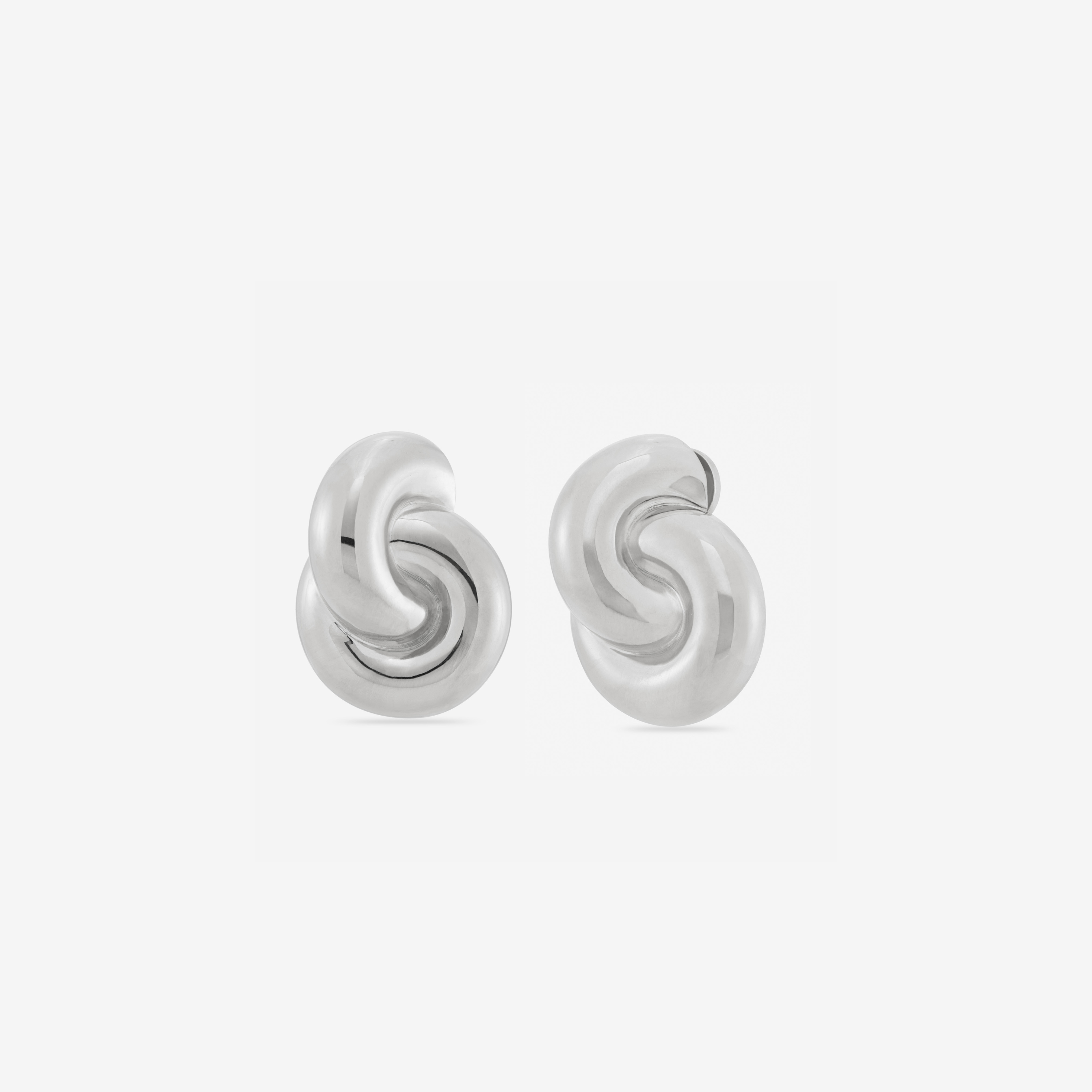 Mini Double Knot Earrings in silver, featuring interlocking loops for a sculptural, polished look.
