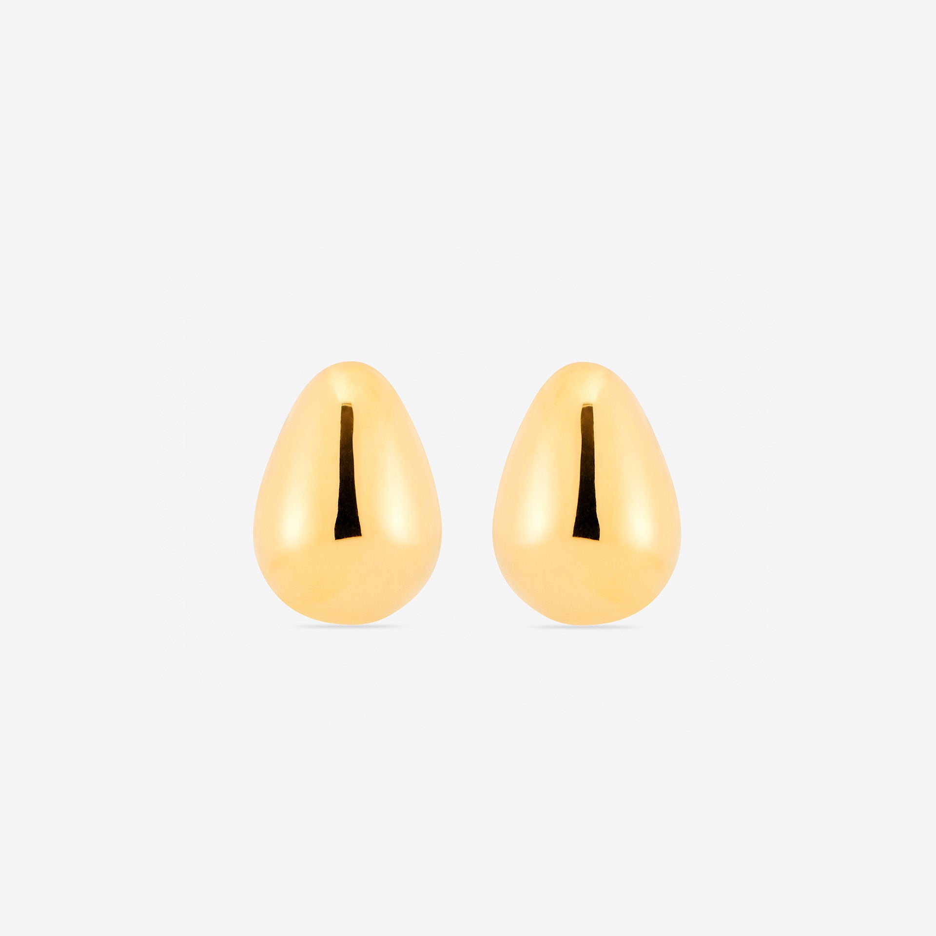 MÉGA Teardrop Earrings in gold vermeil—brass elongated teardrop studs, 5.5 mm to 14.5 mm wide, 20 mm tall.