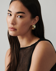 MÉGA Misstep Earrings in gold vermeil—bestselling stepped studs, 31.2 mm tall × 20 mm wide, 12 g with stainless-steel posts.