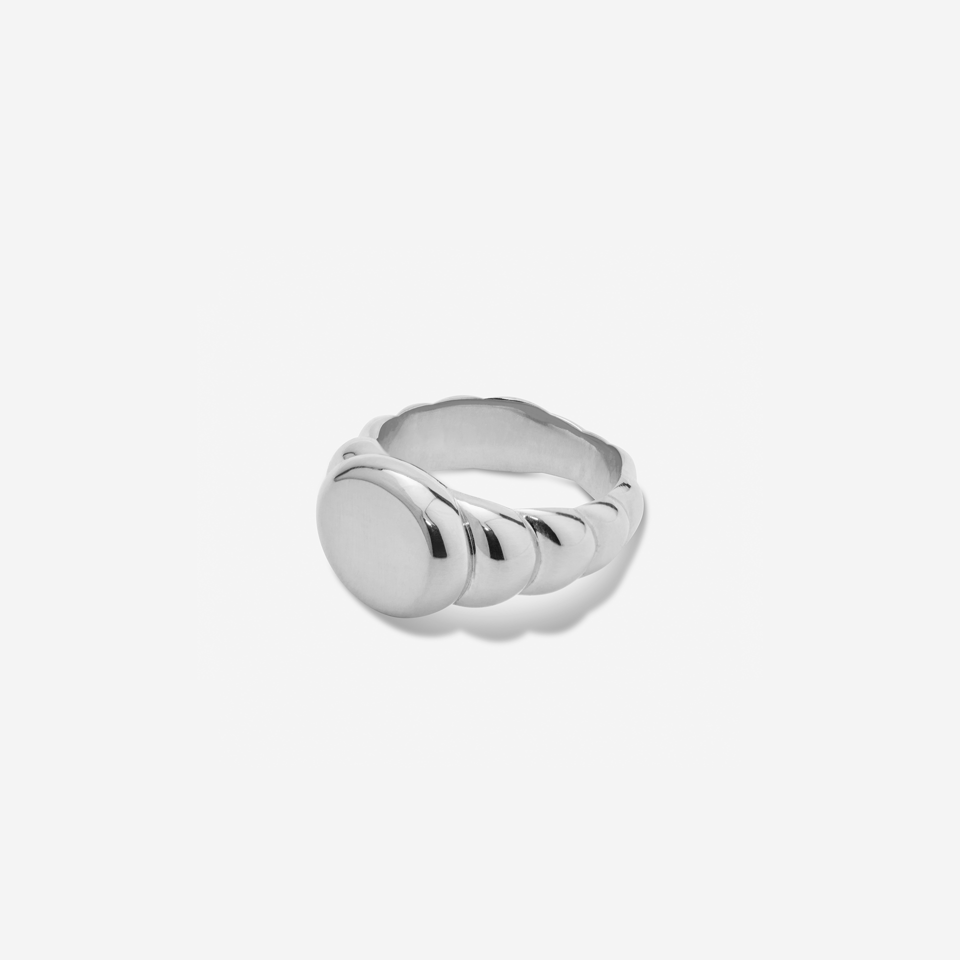 Raised Signet Ring in gold, engravable and bold—modern take on a classic design.