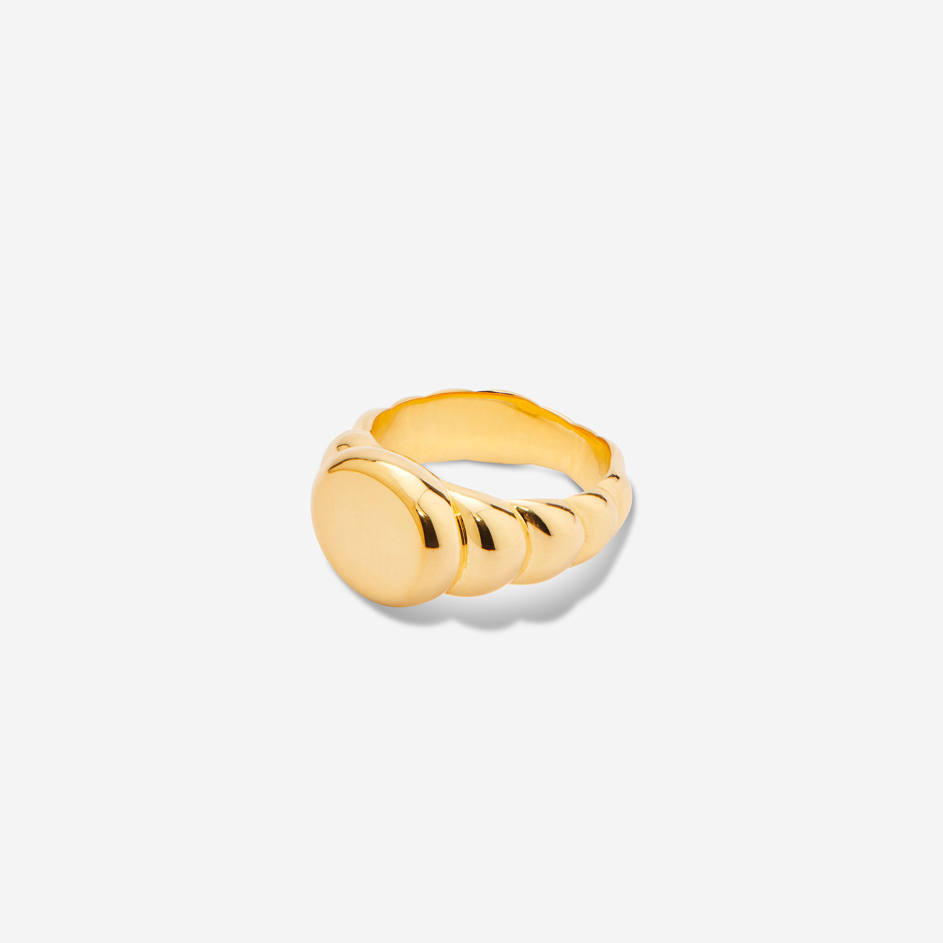 Raised Signet Ring in gold, engravable and bold—modern take on a classic design.