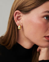 MÉGA Sprinkle Teardrop Earrings in gold vermeil—brass drop earrings sprinkled with CZ stones, 5.5 mm to 14.5 mm wide and 20 mm tall.