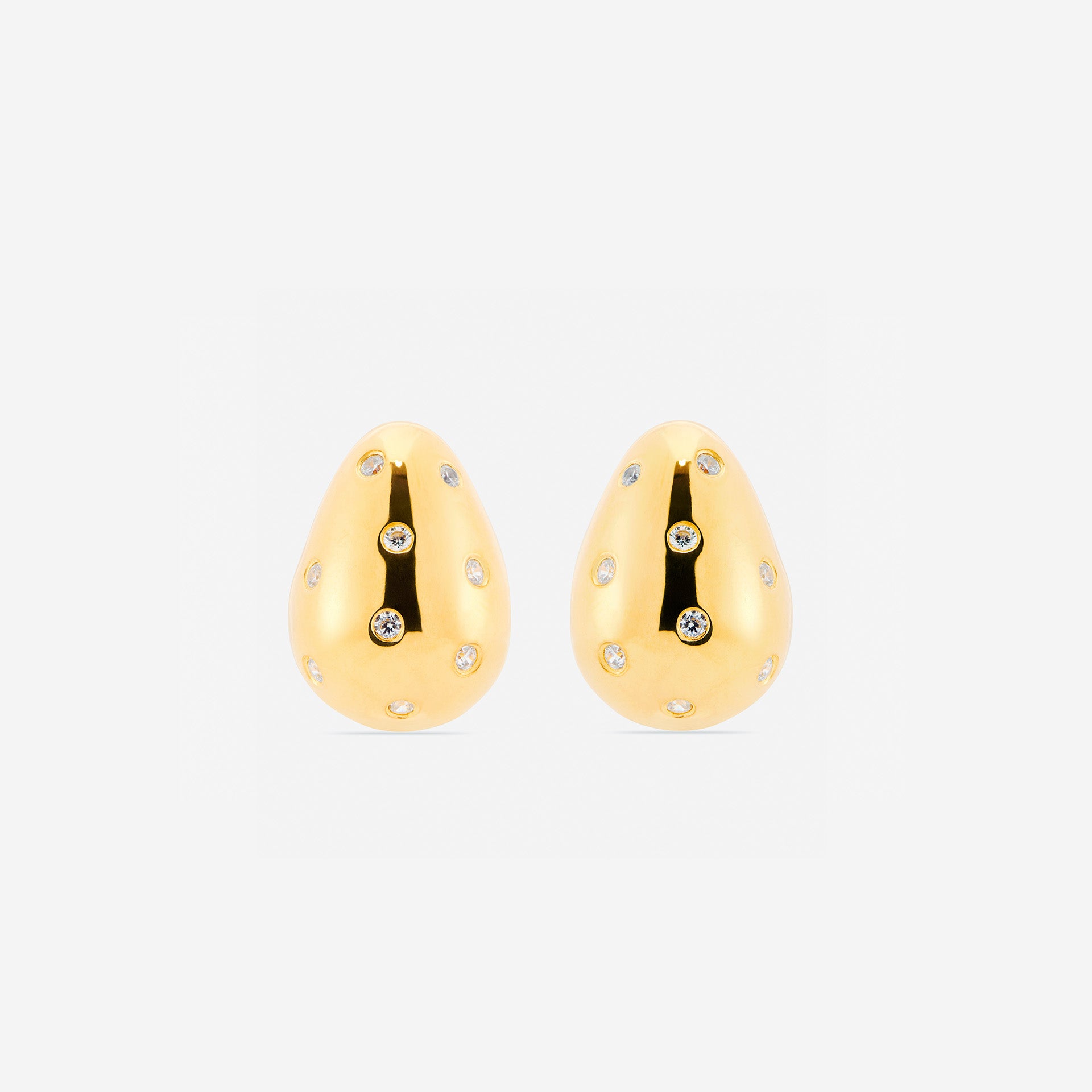 MÉGA Sprinkle Teardrop Earrings in gold vermeil—brass drop earrings sprinkled with CZ stones, 5.5 mm to 14.5 mm wide and 20 mm tall.