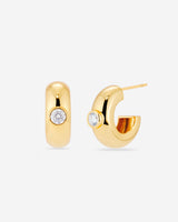 MÉGA Small Donut Earrings in gold vermeil—16.1 mm × 7.6 mm CZ-studded mini hoops with stainless‑steel posts, lightweight 9.56 g.