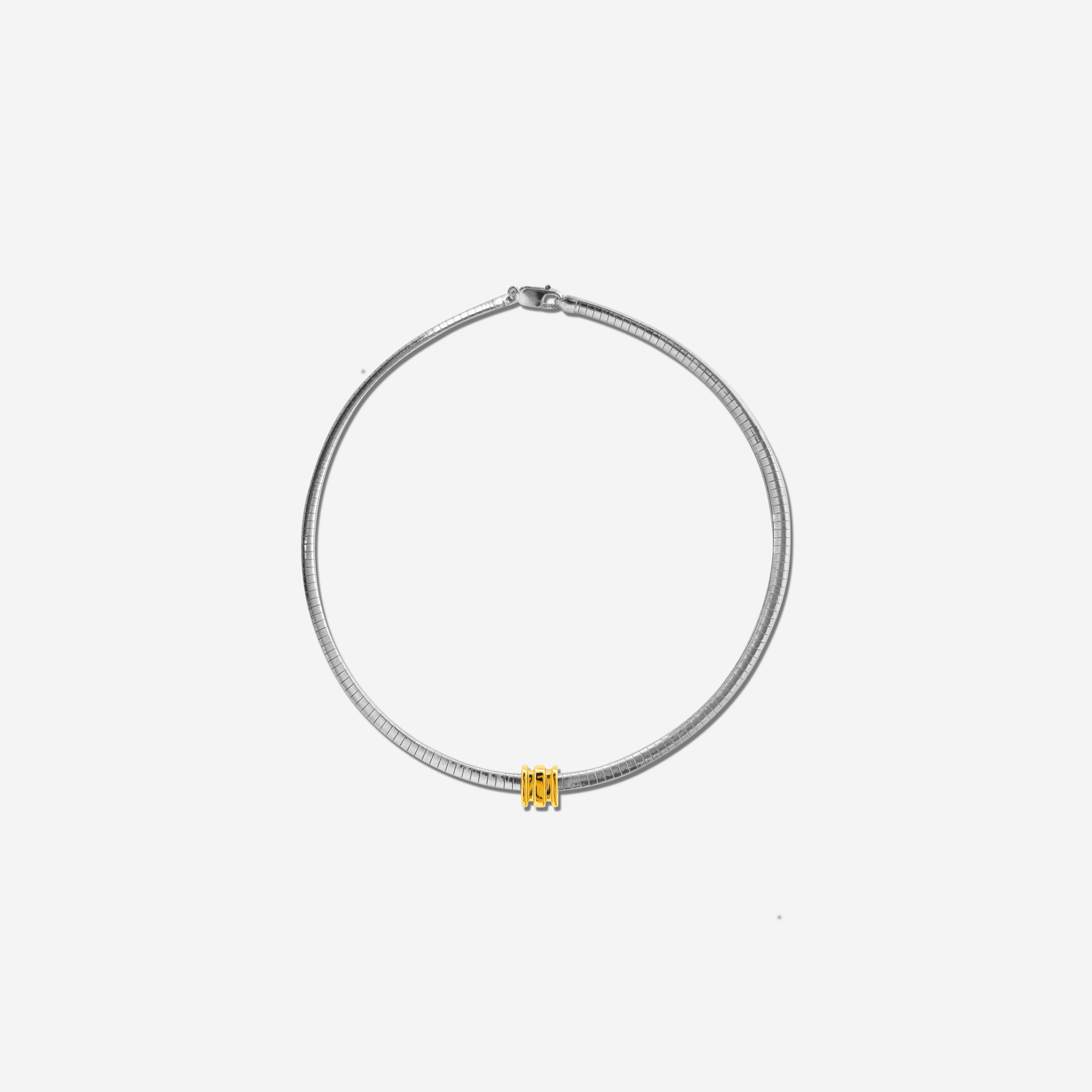 Small Omega Charm in gold, designed for the Omega 4 Necklace – delicate, polished, and stackable.