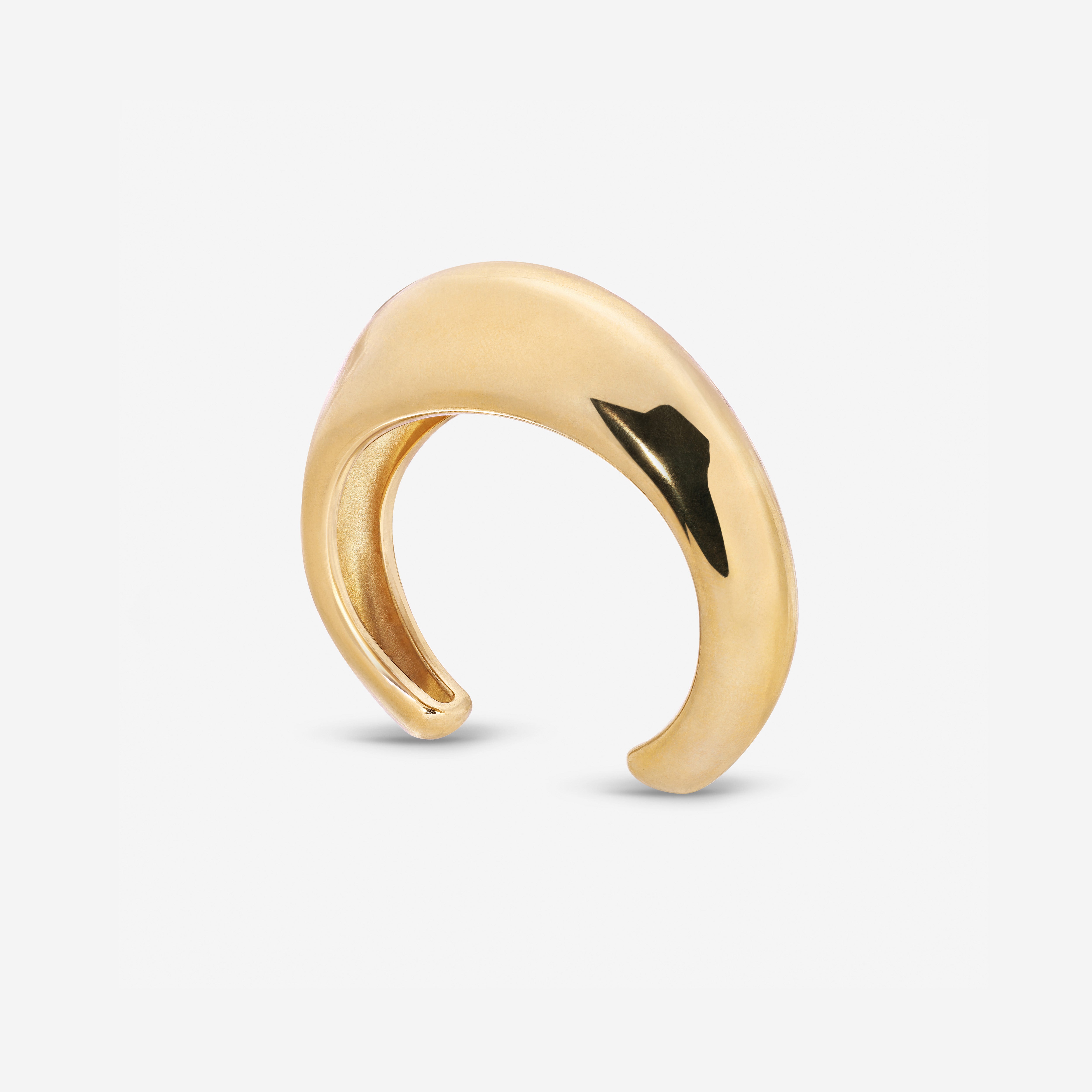 Lightweight brass Wave Cuff styled with minimalist jewelry