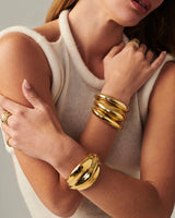 MÉGA Simone Cuff in gold vermeil—brass tapered cuff 42.5 mm to 14.3 mm wide, 11.7 mm tall, 51 g.