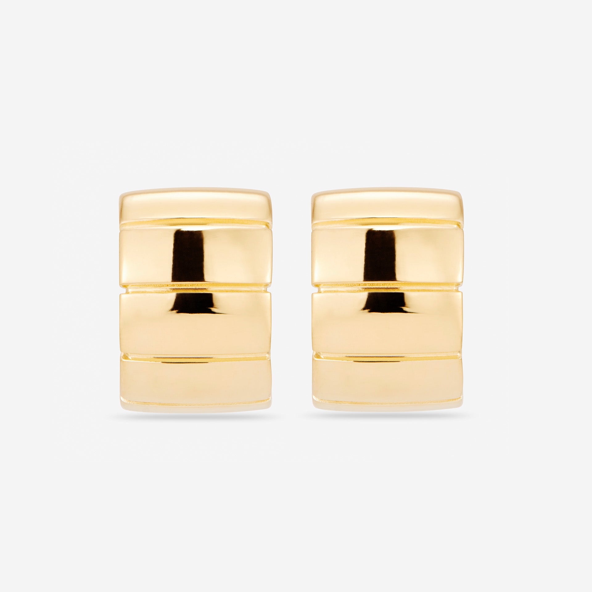Chunky sculptural hoop earrings with a bold, rounded silhouette – lightweight and easy to wear daily.