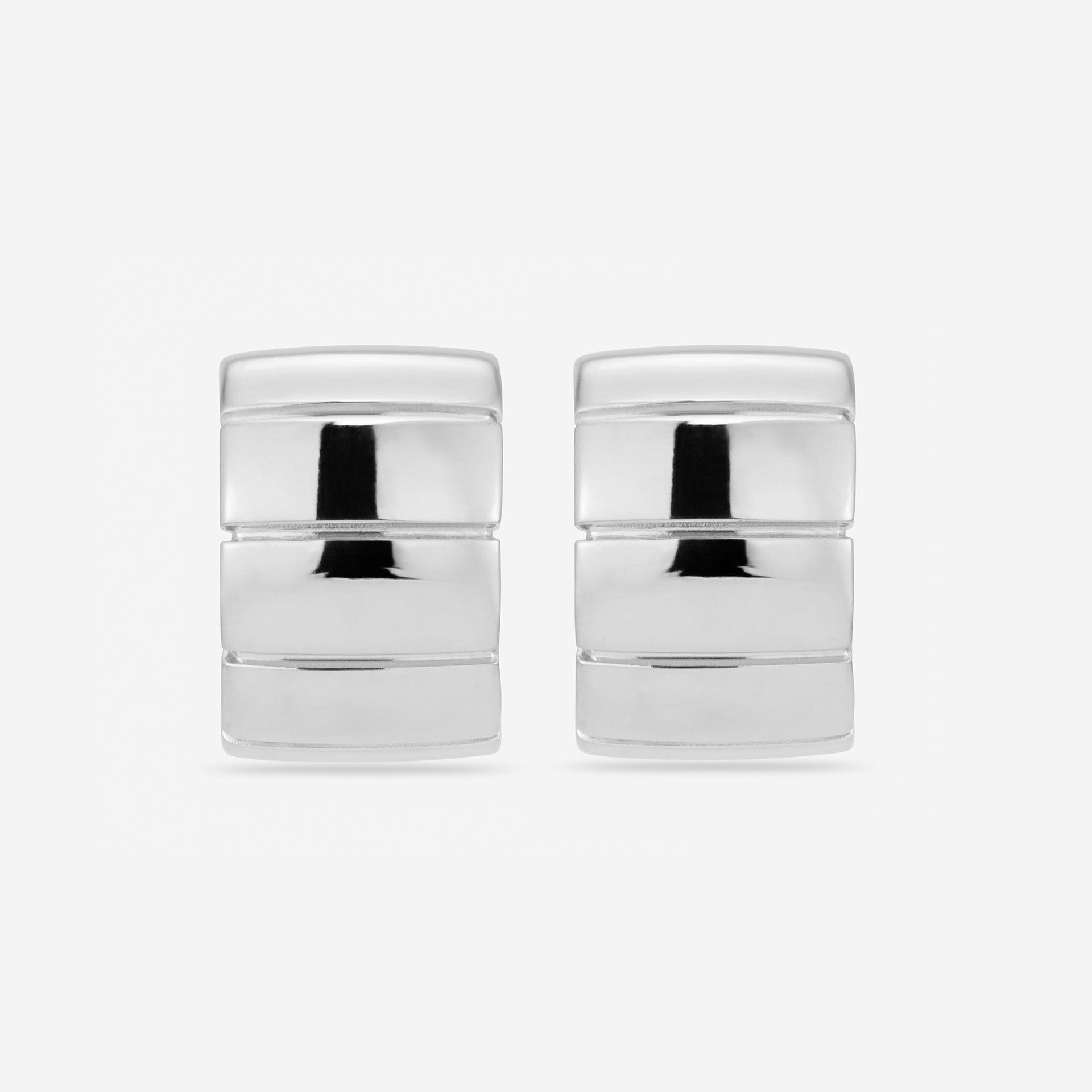 Chunky sculptural hoop earrings with a bold, rounded silhouette – lightweight and easy to wear daily