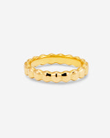 MÉGA High Low Ring in gold vermeil—sterling silver band with elevated and tapered sides, 4 mm wide, 2.5 mm tall.
