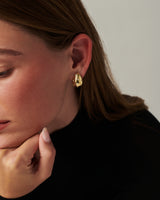 MÉGA Sprinkle Teardrop Earrings in gold vermeil—brass drop earrings sprinkled with CZ stones, 5.5 mm to 14.5 mm wide and 20 mm tall.