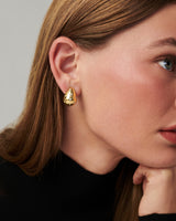 MÉGA Sprinkle Teardrop Earrings in gold vermeil—brass drop earrings sprinkled with CZ stones, 5.5 mm to 14.5 mm wide and 20 mm tall.