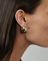 MÉGA Dalmatian Earrings in gold vermeil—sculptural studs with scattered CZ accents, stainless-steel posts, lightweight and refined.