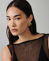 MÉGA Croissant Earrings in gold vermeil—rounded sculptural brass hoops, 28.6 mm × 31.9 mm with stainless-steel posts, lightweight at 10 g.