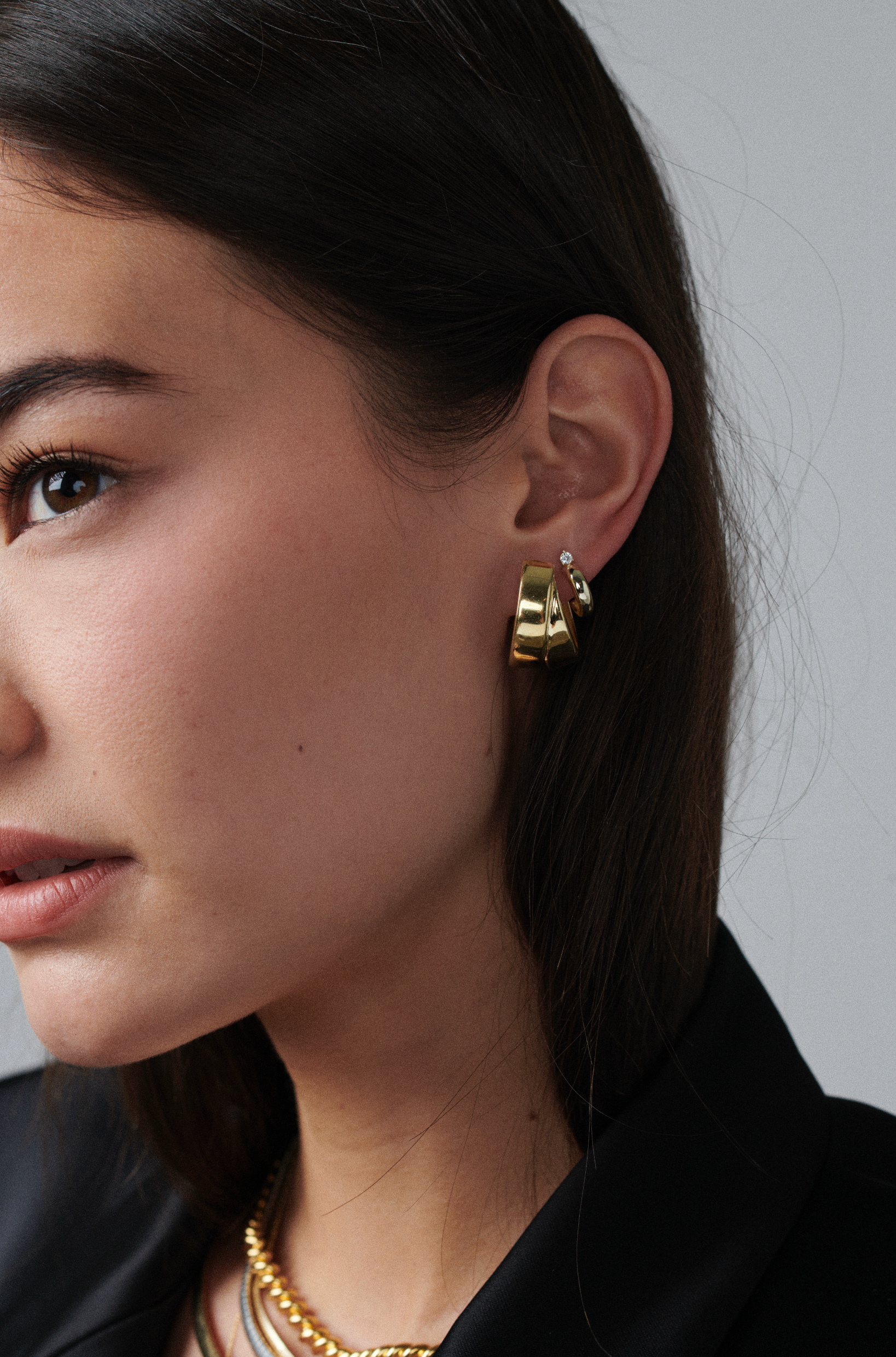 MÉGA Chunky Double Hoop Earrings in gold vermeil—two bold hoops (25 mm × 15 mm), stainless-steel posts, lightweight 5.99 g.