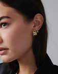 MÉGA Chunky Double Hoop Earrings in gold vermeil—two bold hoops (25 mm × 15 mm), stainless-steel posts, lightweight 5.99 g.