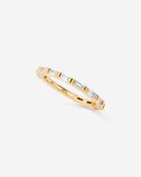 Sculptural ring with twin baguette stones, designed for modern stacking or solo wear. A sleek, architectural statement in your everyday rotation.