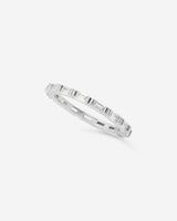 Sculptural ring with twin baguette stones, designed for modern stacking or solo wear. A sleek, architectural statement in your everyday rotation.