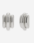 MÉGA Tubes Earrings in gold vermeil—35 mm × 22.8 mm tubular brass sculptures, 10 g with stainless steel posts.